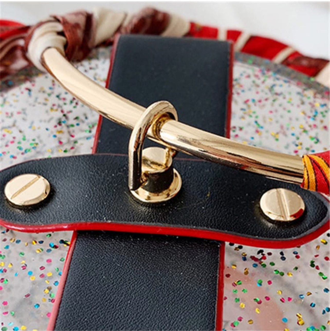 Glittery cylinder wristlet