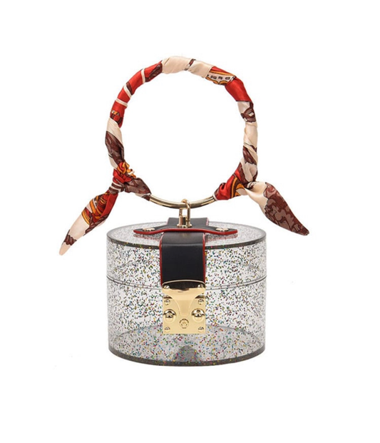 Glittery cylinder wristlet
